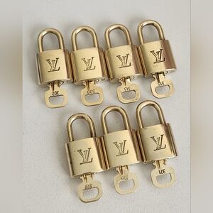 ONE Louis Vuitton Gold Padlock with Key Random Number